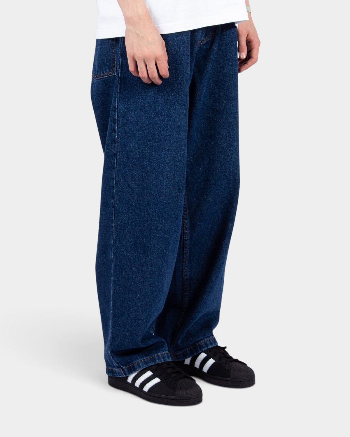 Lockwood Avenue Polar Big Boy baggy dark blue denim jeans with a tapered leg fit worn by a model