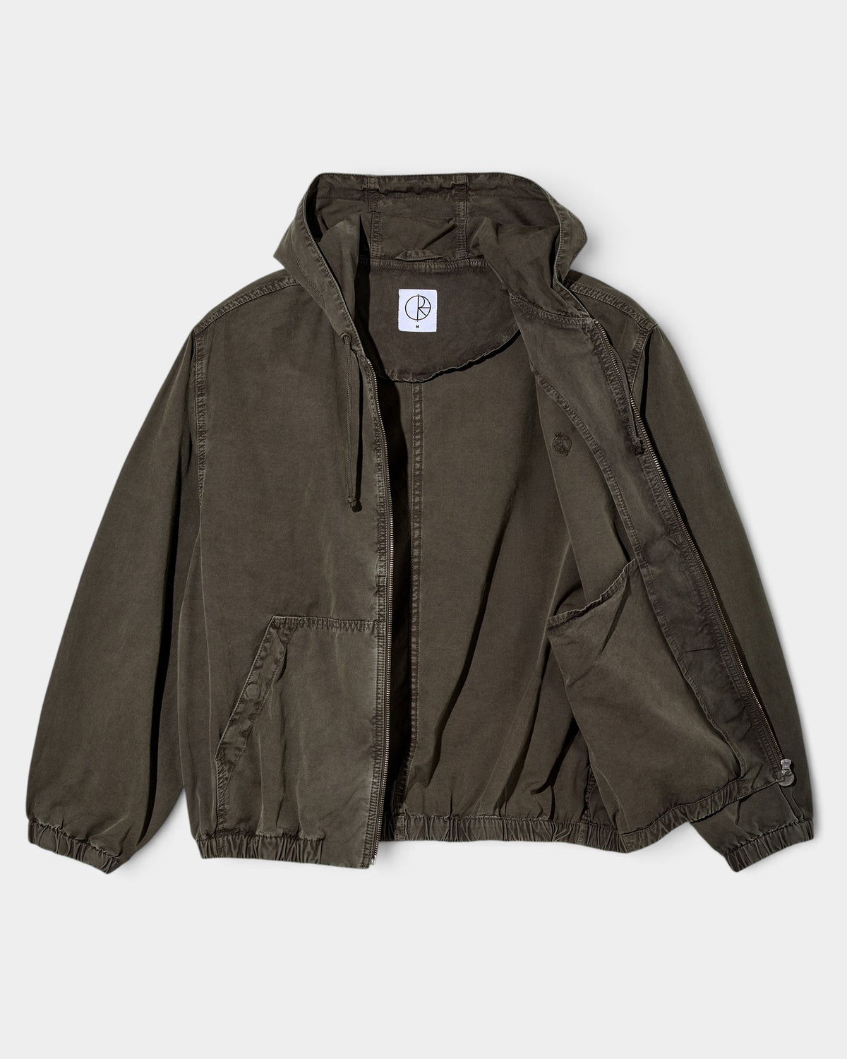 Lockwood Avenue Polar Hooded Nick Jacket in dark olive garment-dyed cotton canvas with a wide fit and front pockets.