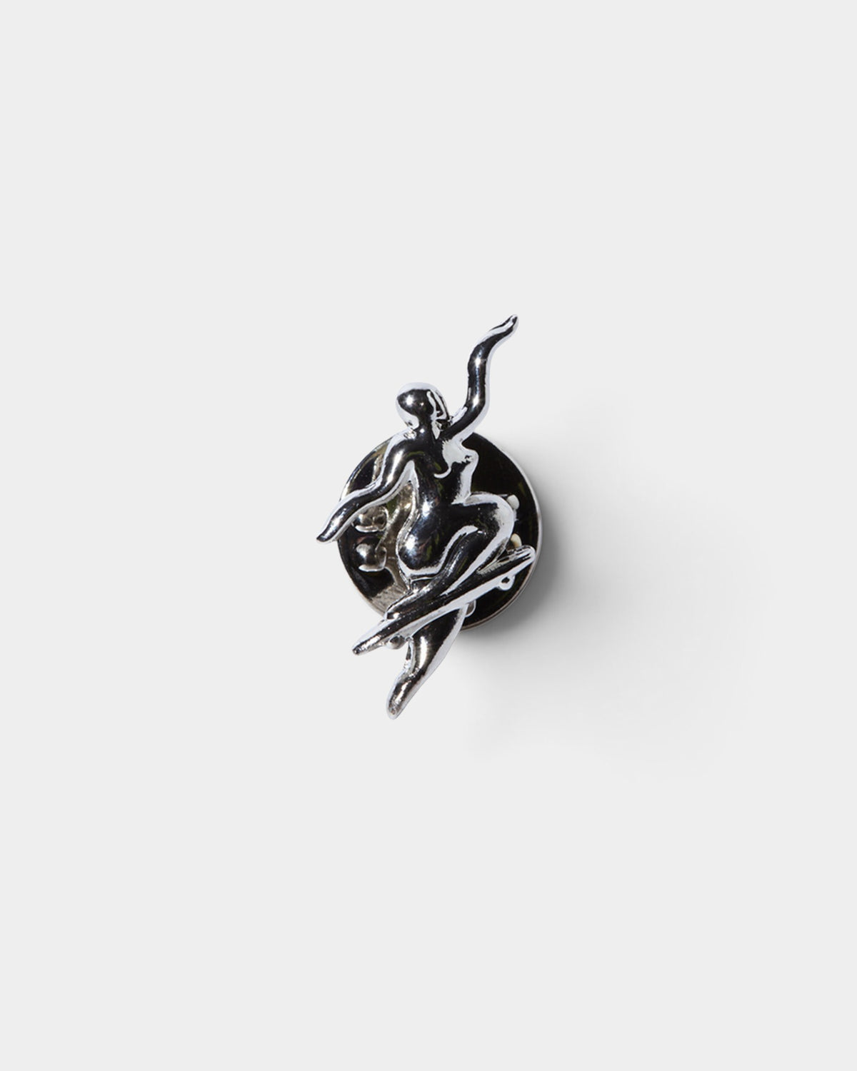 Lockwood Avenue silver metal enamel pin featuring Pontus Alv artwork of a figure performing a no-comply skateboard trick