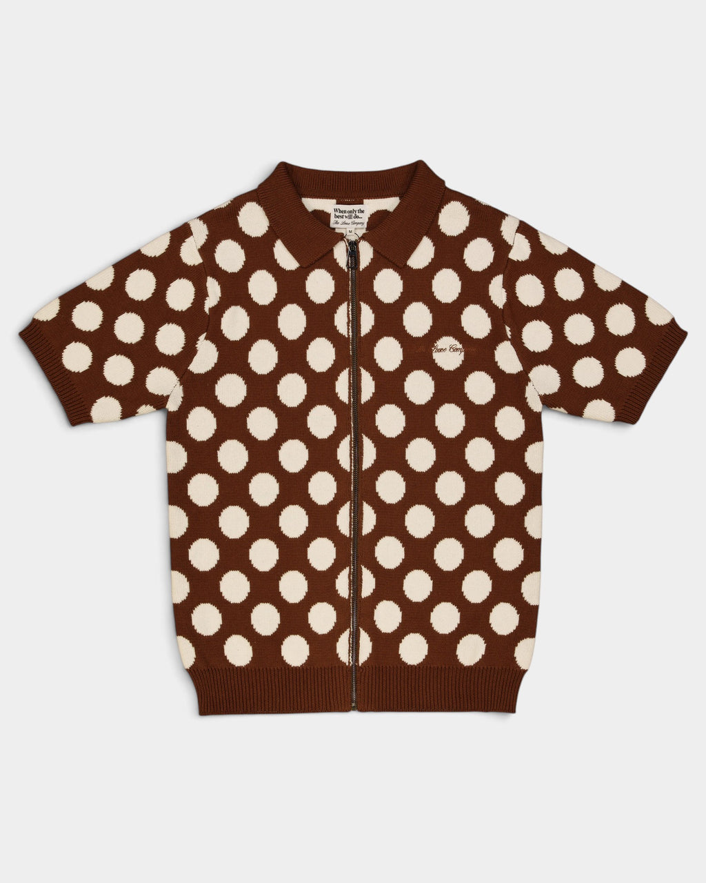 Lockwood Avenue The Loose Company brown and cream polka dot knit zip-up polo shirt with ribbed trim.