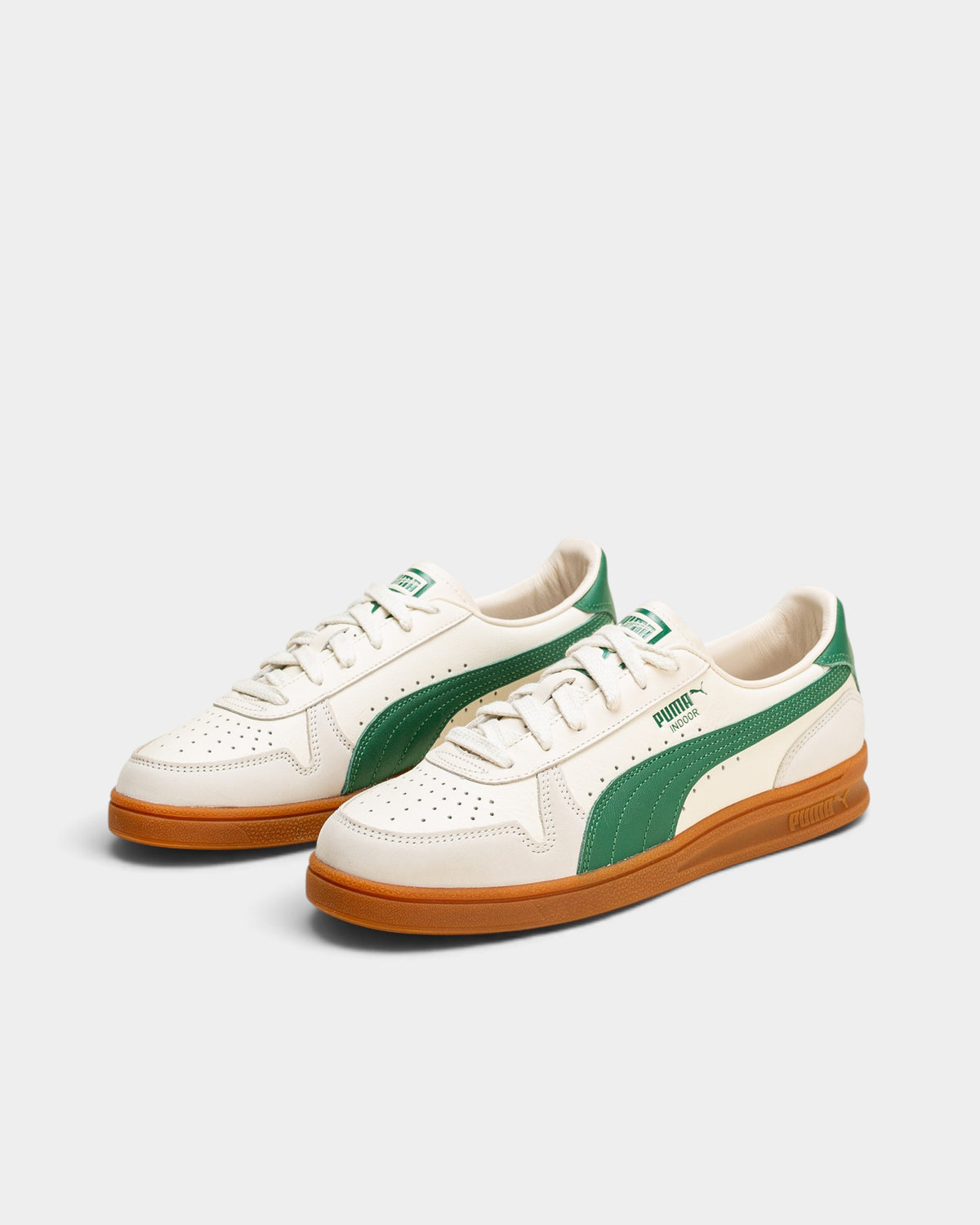 Lockwood Avenue Puma Indoor OG sneakers in frosted ivory leather with vine green accents and a gum rubber outsole.