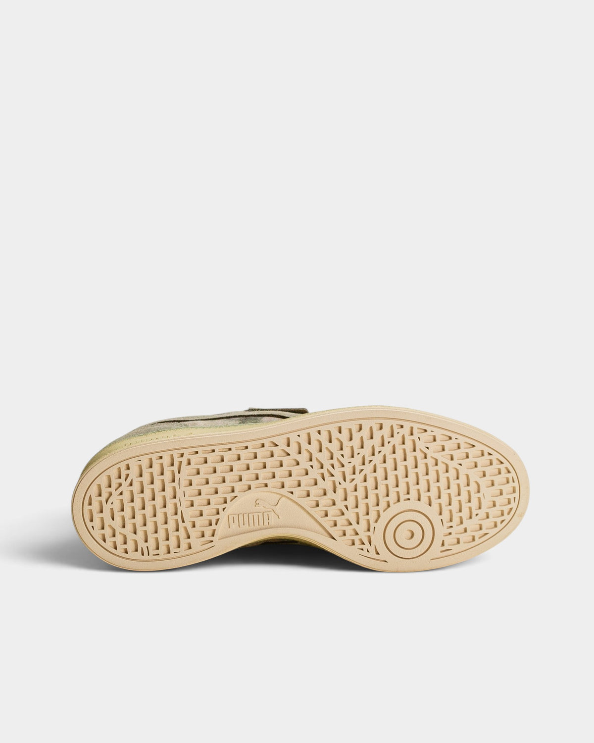 Lockwood Avenue Puma KidSuper Indoor distressed green sneaker showing the textured rubber outsole and tread pattern.