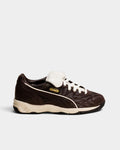 Lockwood Avenue Puma King indoor premium shoes in dark chocolate leather with a white fold-over tongue and rubber sole.