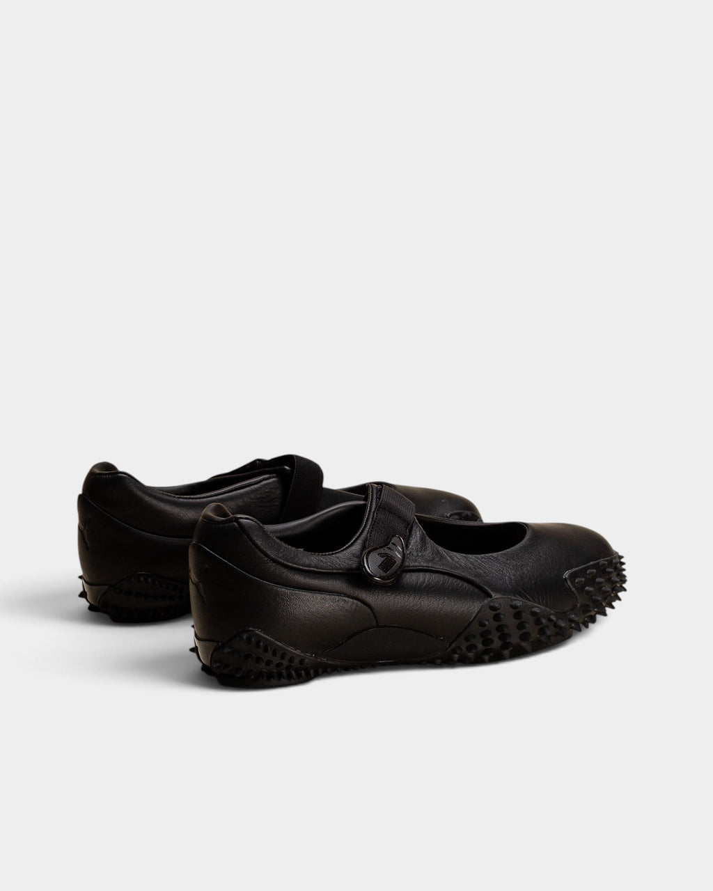 Lockwood Avenue Puma Mostro Fey LTH black leather Mary Jane shoes with a single strap and spiked rubber outsole