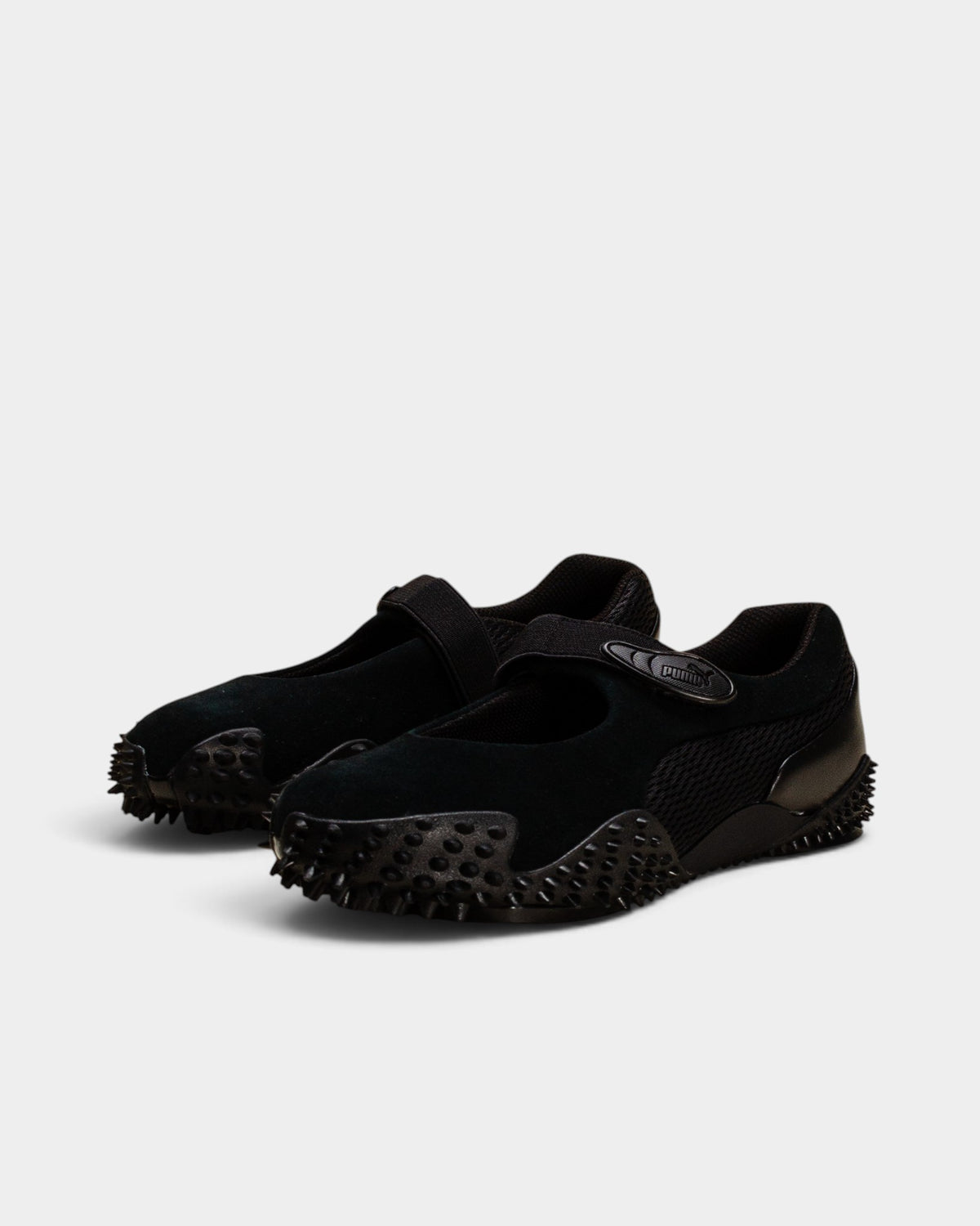 Lockwood Avenue Puma Mostro Fey PRM black Mary Jane shoes with suede, mesh, and signature spiked rubber outsoles.
