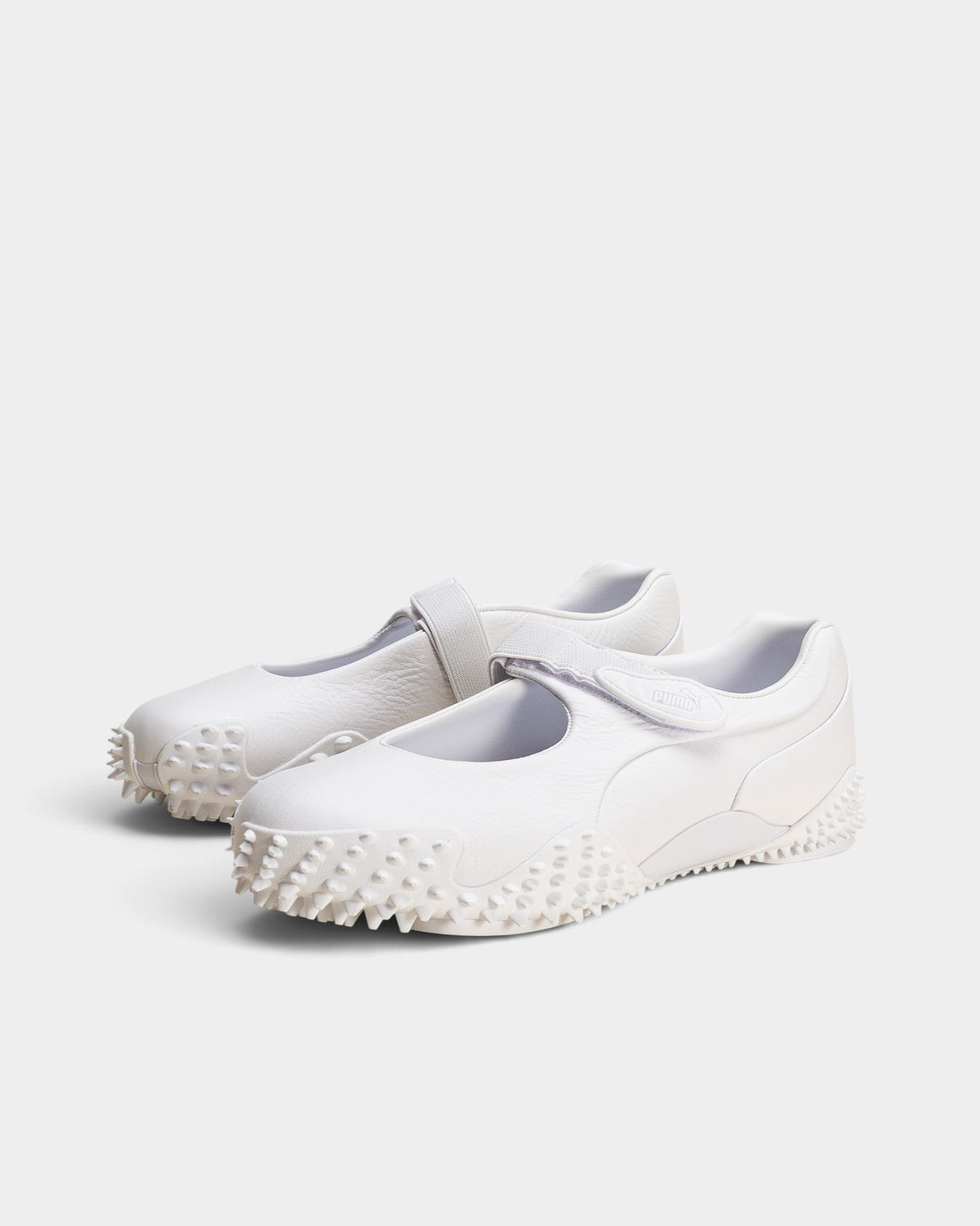 Lockwood Avenue Puma Mostro Fey LTH white leather Mary Jane shoes with a single strap and spiked rubber outsole
