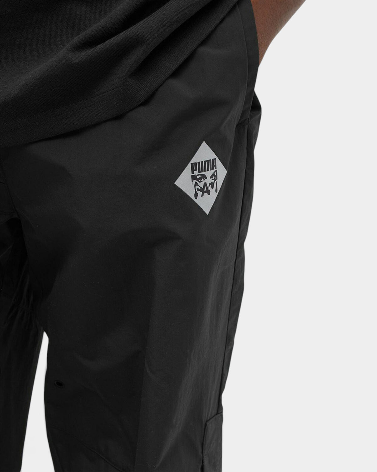 Lockwood Avenue Puma x Perks And Mini black nylon Cordura technical pants with reflective co-branded logo detail