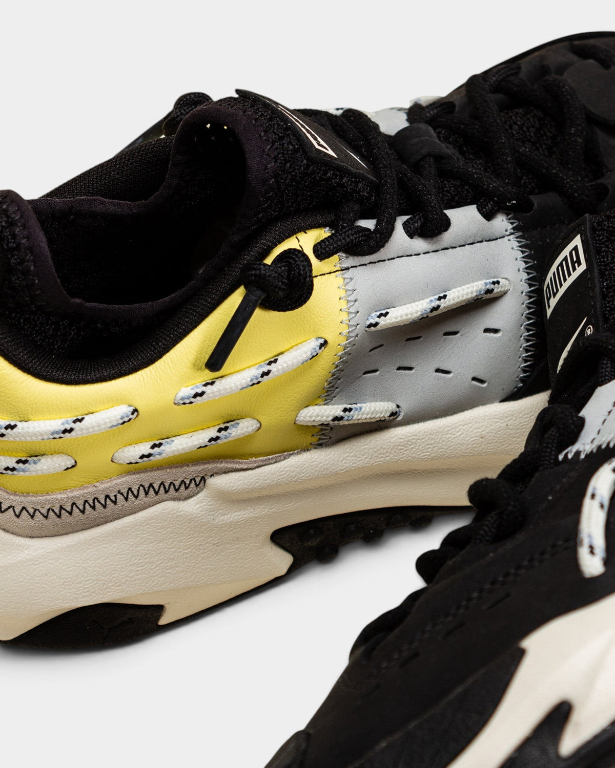 Lockwood Avenue Puma Plexus Retro sneakers in black with pale lemon and grey layered nubuck, leather, and suede