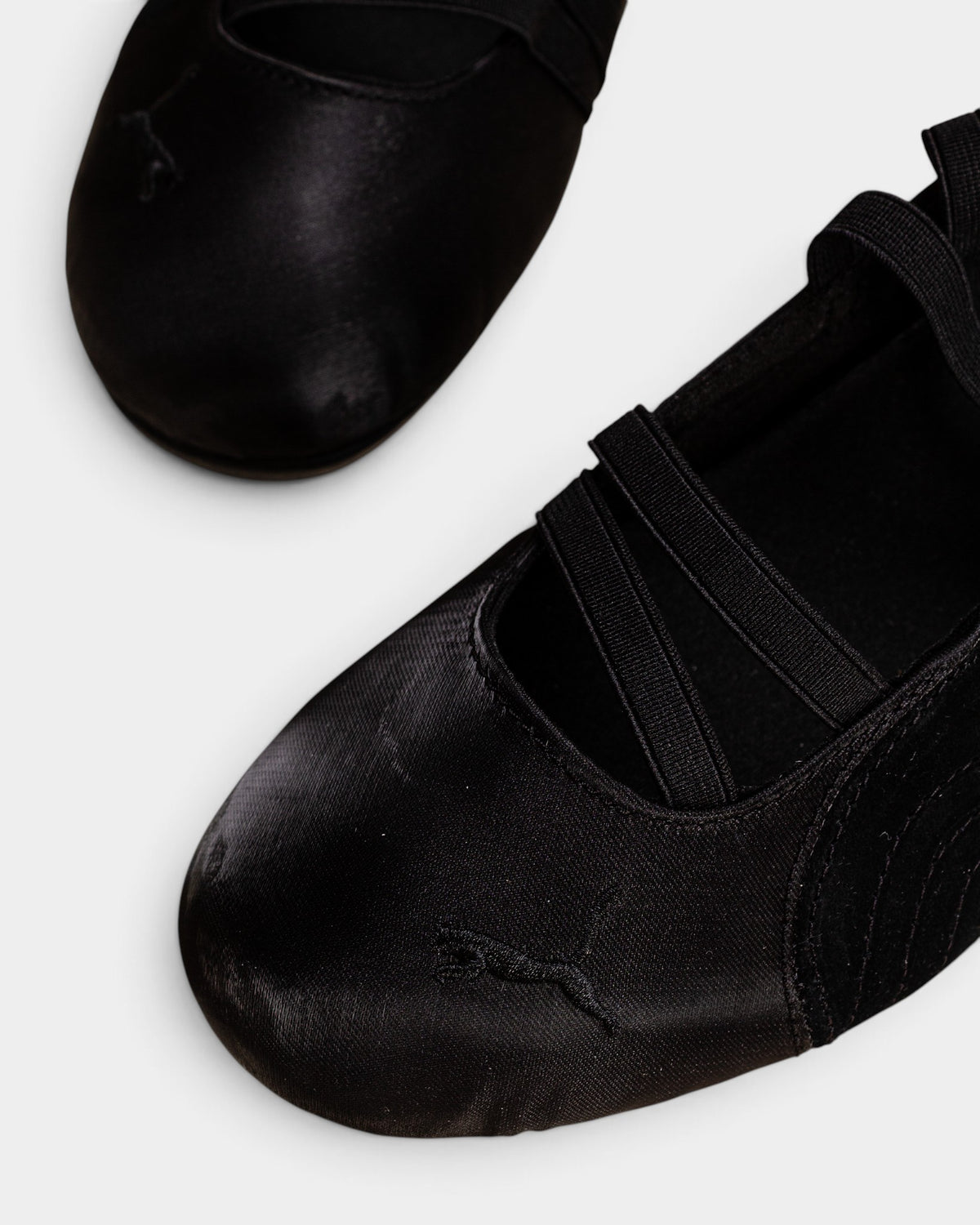 Lockwood Avenue Puma Speedcat Ballet Satin shoes in black with elastic instep straps and embroidered cat logo