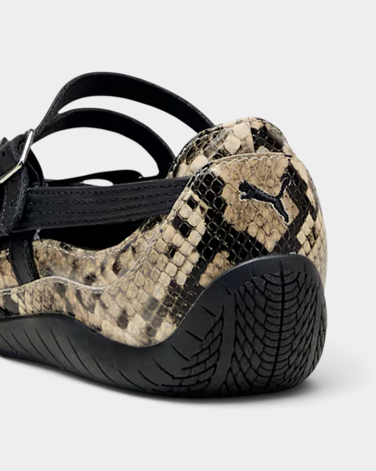 Lockwood Avenue Puma Speedcat Ballet snake-print shoes in black and gray with buckle strap and rubber heel detail.