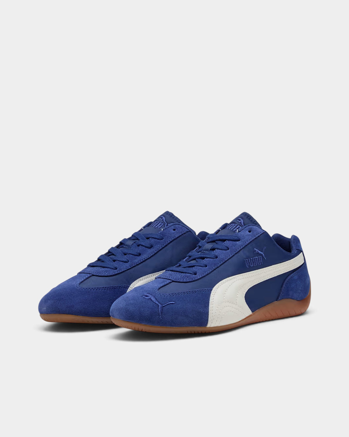 Lockwood Avenue Puma Speedcat nylon sneakers in Blue Jewel with white Formstrip and low-profile gum rubber sole.