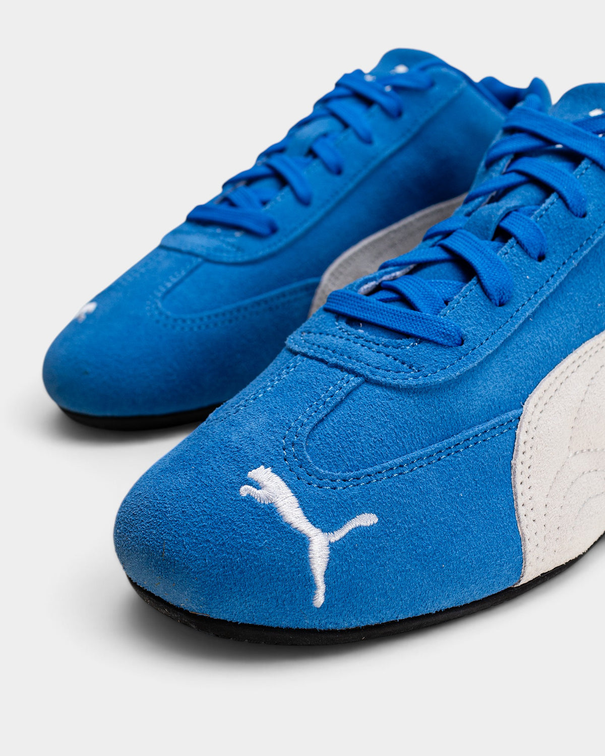 Lockwood Avenue Puma Speedcat OG sneakers in Team Royal blue suede with a white Puma Formstrip and slim rubber sole.