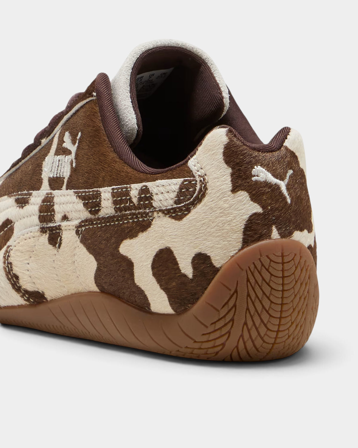 Lockwood Avenue Puma Speedcat shoes in cream and brown faux cow-hair with a gum rubber motorsport outsole