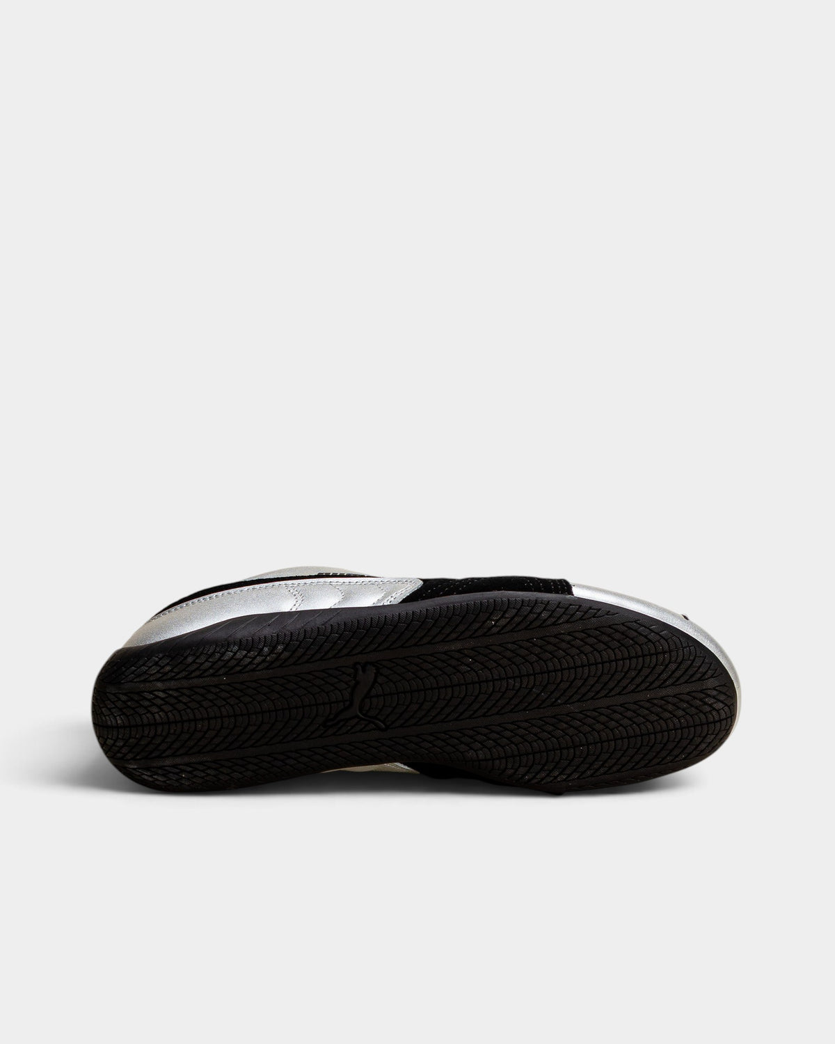 Lockwood Avenue Puma Speedcat Metallic driving shoe showing the black rubber outsole with motorsport tread pattern