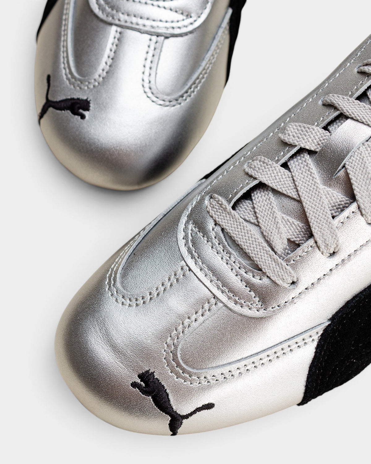 Lockwood Avenue Puma Speedcat Metallic silver synthetic sneakers with black suede Formstrip and slim profile