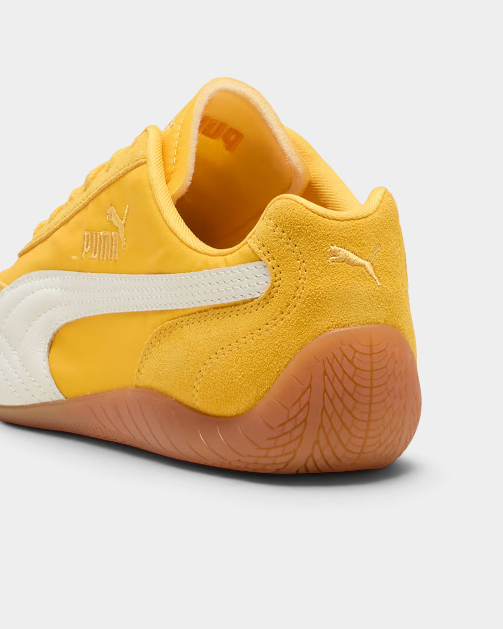 Lockwood Avenue Puma Speedcat nylon sneakers in Yellow Sizzle with white Formstrip and gum rubber heel detail.
