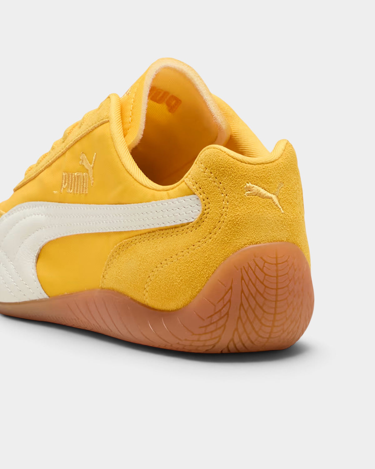 Lockwood Avenue Puma Speedcat nylon sneakers in Yellow Sizzle with white Formstrip and gum rubber heel detail.