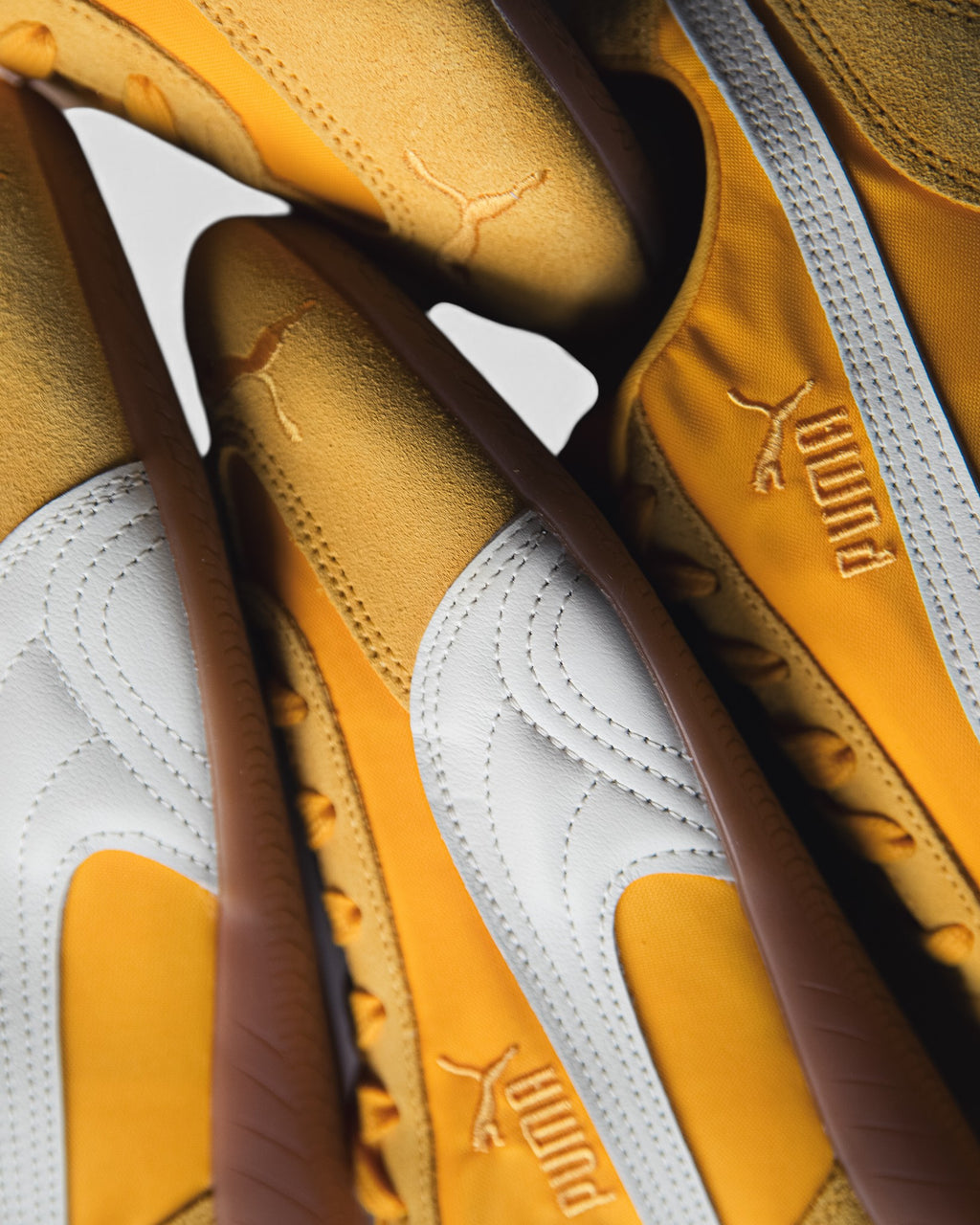 Lockwood Avenue Puma Speedcat nylon sneakers in yellow sizzle with white leather formstrip and low-profile rubber sole