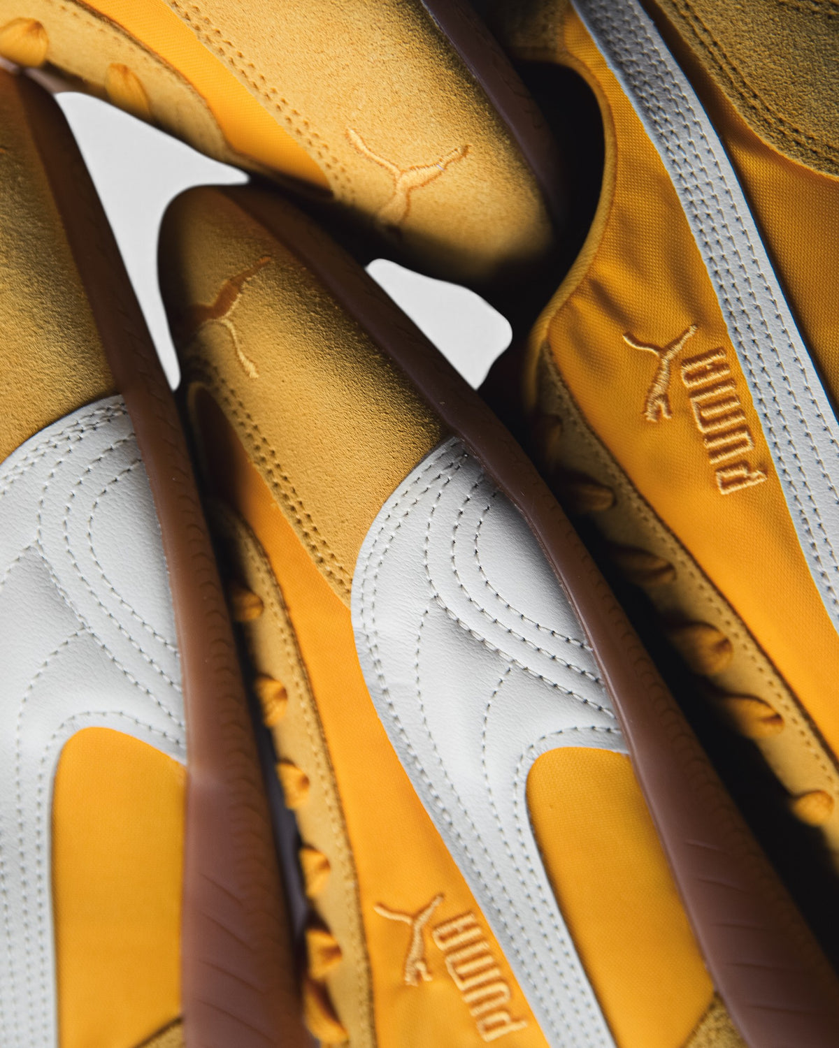 Lockwood Avenue Puma Speedcat nylon sneakers in yellow sizzle with white leather formstrip and low-profile rubber sole