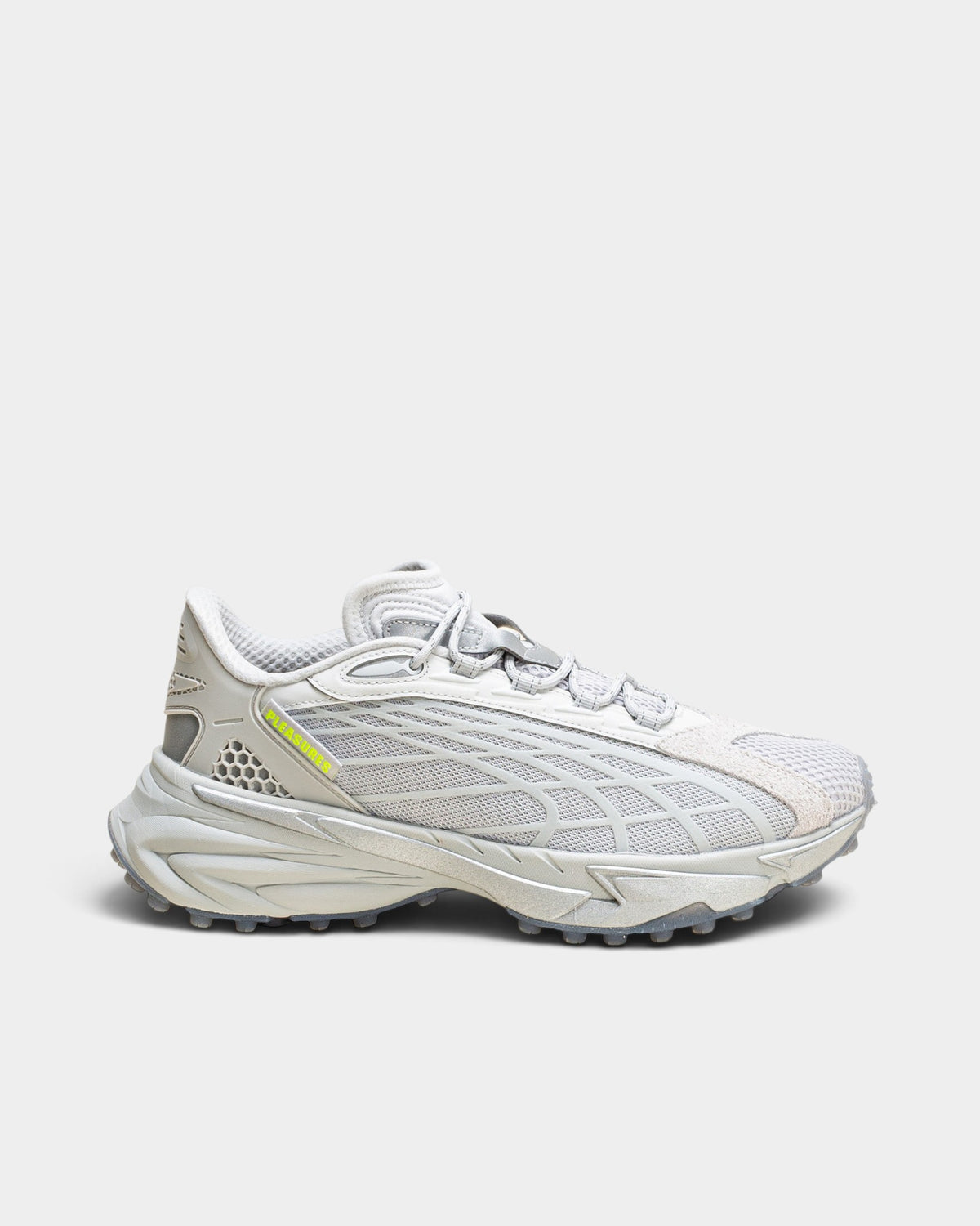 Lockwood Avenue Puma Spirex x PLEASURES glacial gray sneakers with mesh, suede, and spike-runner rubber outsole.