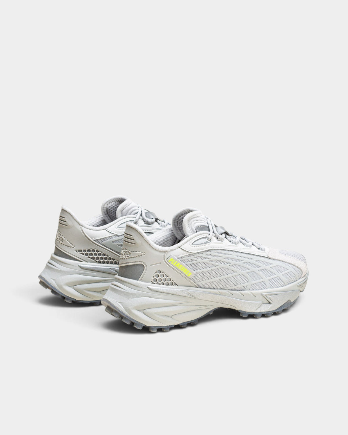 Lockwood Avenue Puma Spirex x PLEASURES glacial gray sneakers with mesh, suede, and spike-runner rubber outsole.