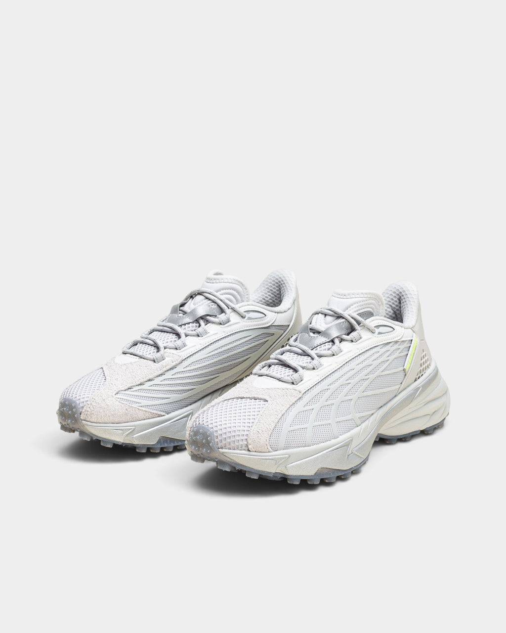 Lockwood Avenue Puma Spirex x PLEASURES sneakers in glacial gray with mesh, hairy suede, and spike-runner outsole.