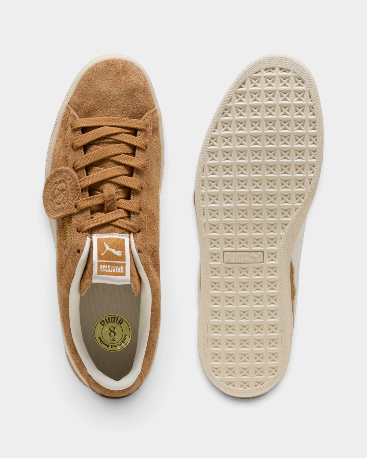 Lockwood Avenue Puma Suede Charles F. Stead sneakers in honey butter suede with white rubber outsoles, top view.