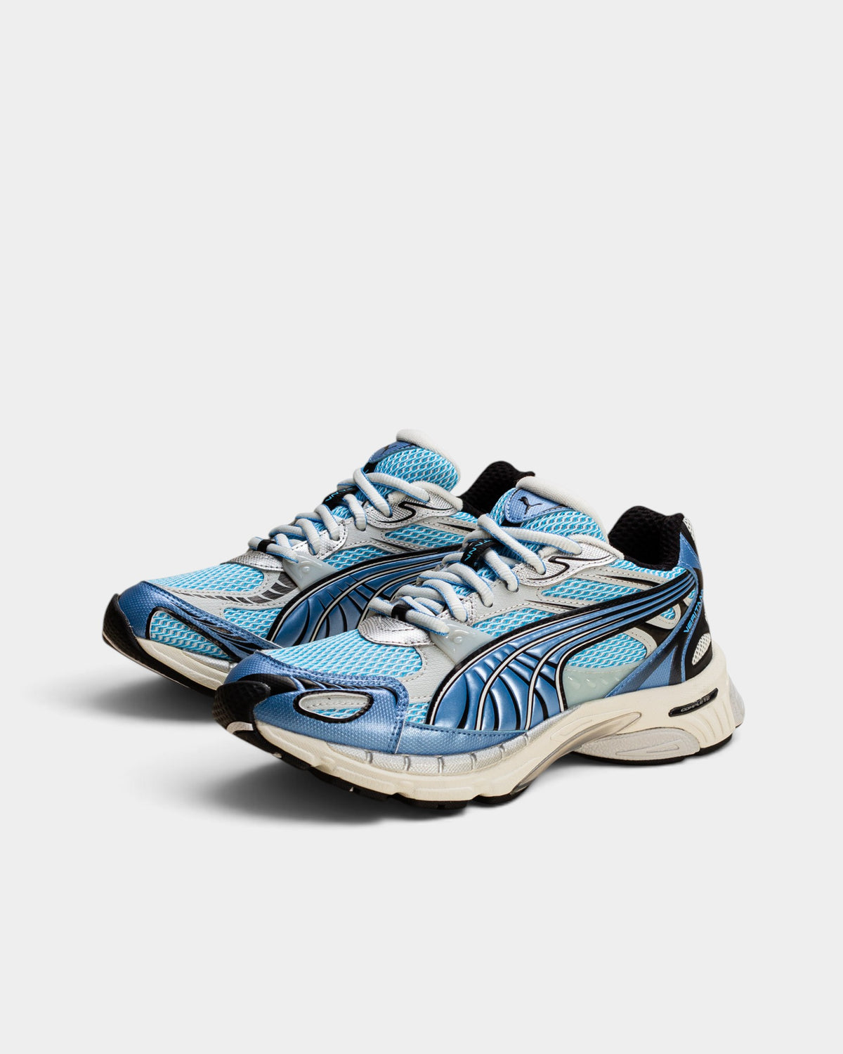 Lockwood Avenue Puma Veritana Sentient runner in bright aqua and white mesh with synthetic leather overlays.