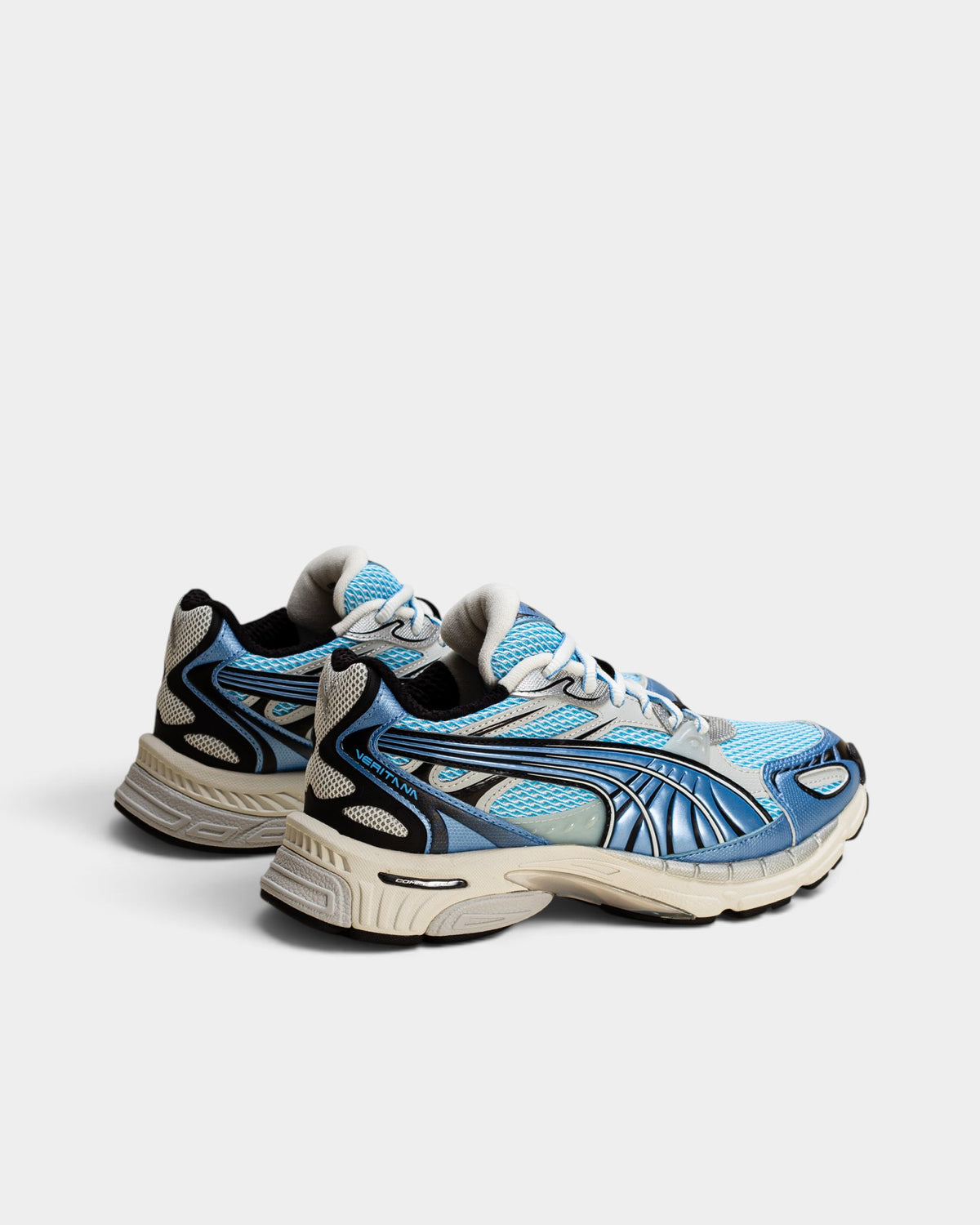 Lockwood Avenue Puma Veritana Sentient runner in white and bright aqua mesh with synthetic leather overlays