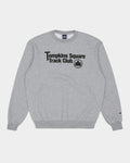 Lockwood Avenue Quartersnacks grey crewneck sweatshirt with Tompkins Square Track Club graphic and Champion logo.