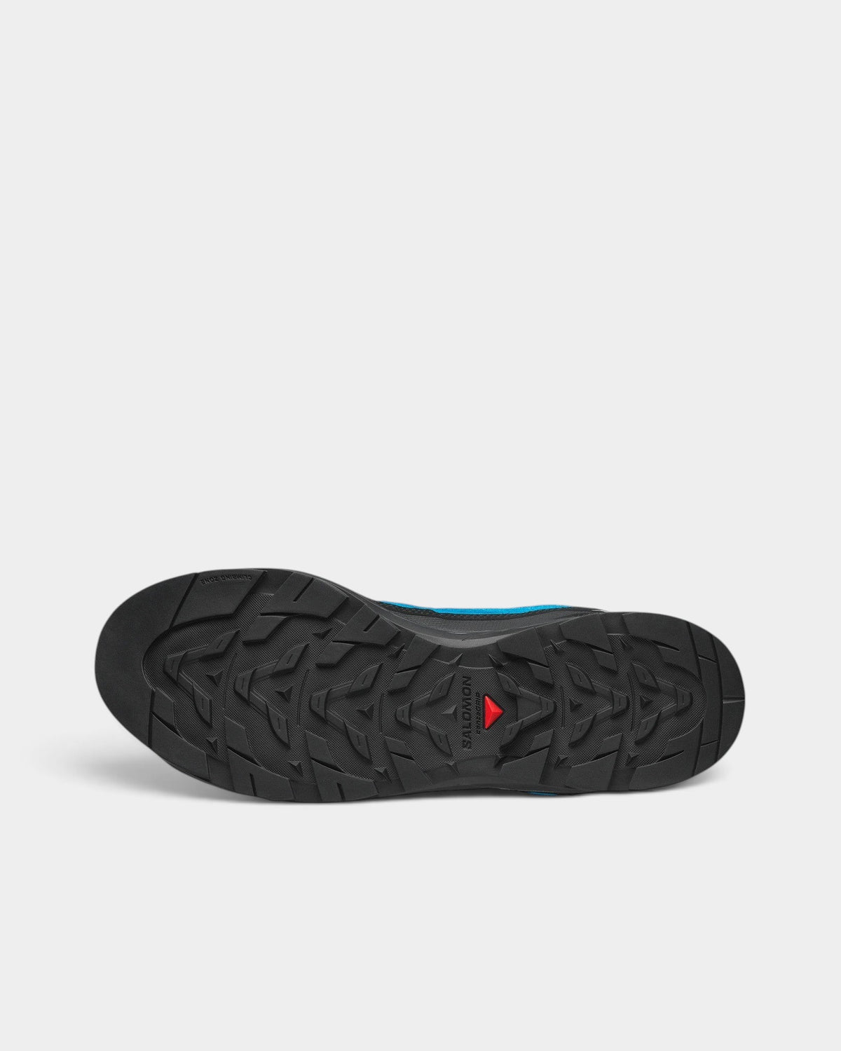 Lockwood Avenue Salomon X-ALP mountaineering shoe showing the black Contagrip rubber outsole with deep traction lugs