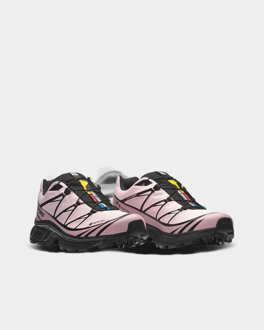 Lockwood Avenue Salomon XT-6 Gore-Tex sneakers in light pink with black accents, waterproof mesh, and Quicklace system.