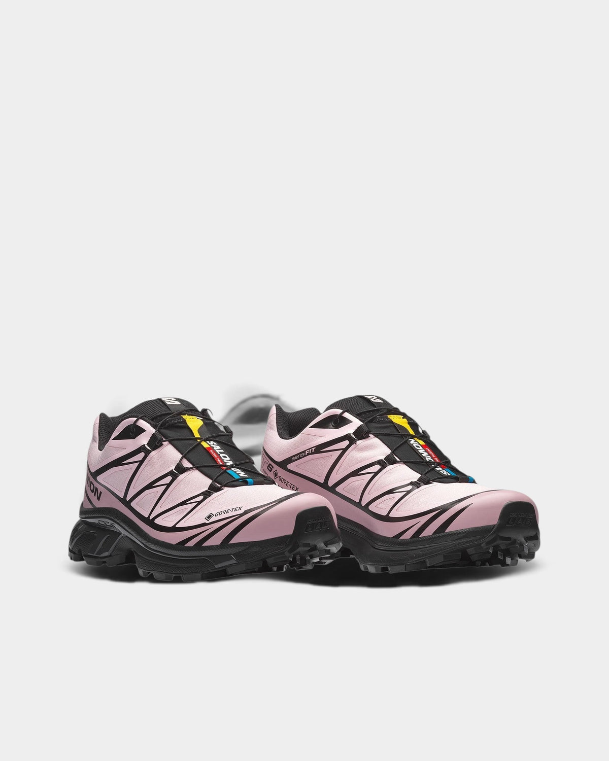 Lockwood Avenue Salomon XT-6 Gore-Tex sneakers in light pink with black accents, waterproof mesh, and Quicklace system.
