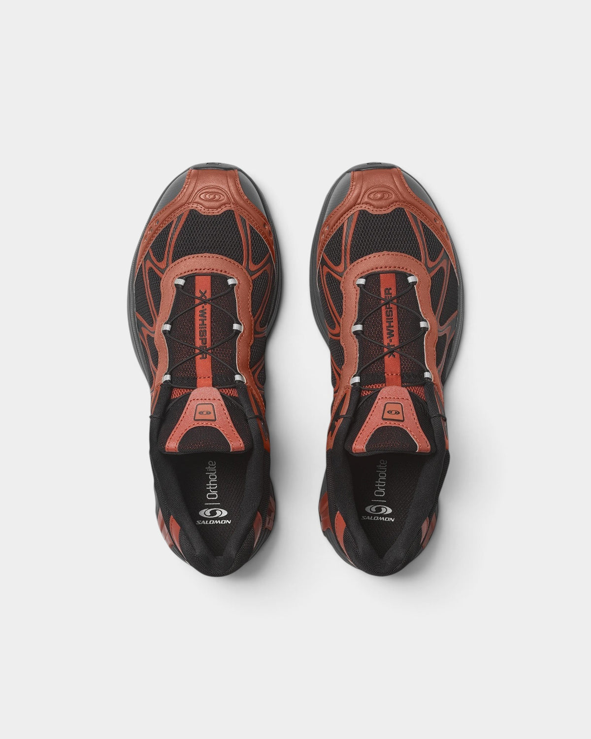 Lockwood Avenue Salomon XT-Whisper trail shoes in black and rust orange with wavy mesh panels and Quicklace system.
