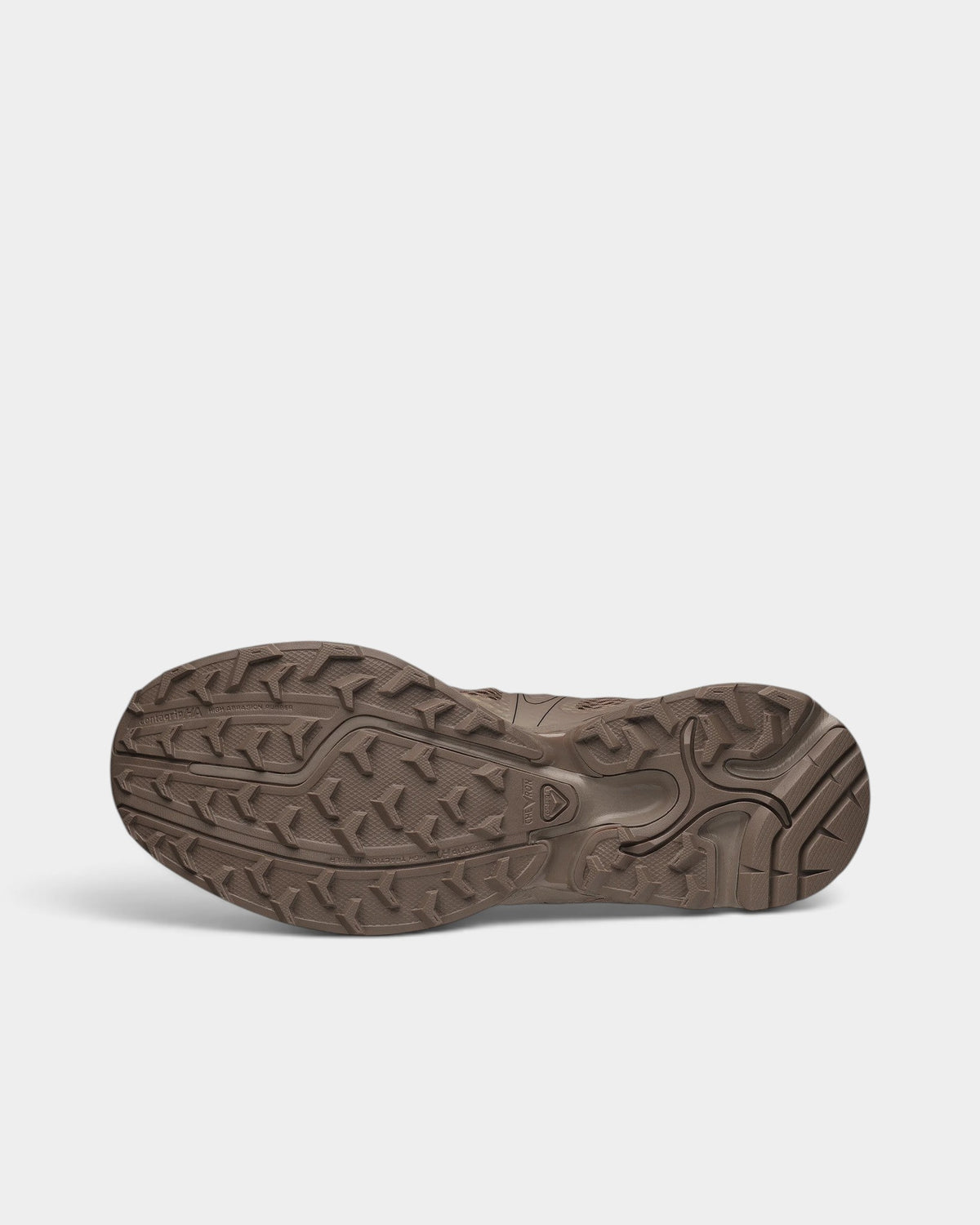 Lockwood Avenue Salomon XT-Whisper Void trail shoe showing the brown Mud Contagrip rubber outsole tread pattern.
