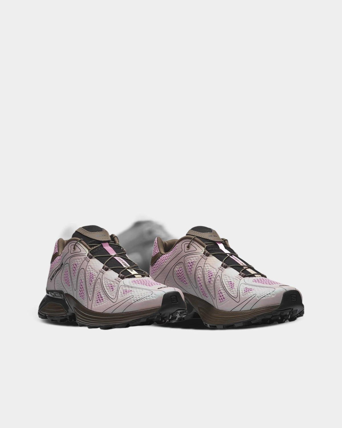 Lockwood Avenue Salomon XT-Whisper Void trail shoes in light grey and pink with 3D mesh, TPU overlays, and Quicklace.