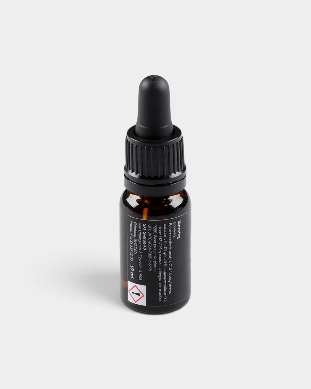 Lockwood Avenue SKF bearing oil in a 10ml amber glass bottle with a black dropper applicator lid