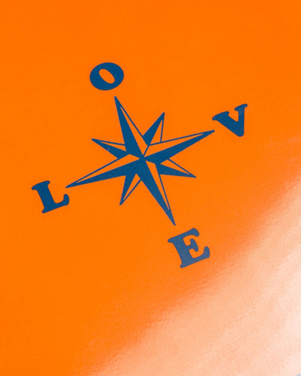 Lockwood Avenue Smos & Baby Bee book cover featuring a blue compass rose graphic with the word LOVE on orange paper