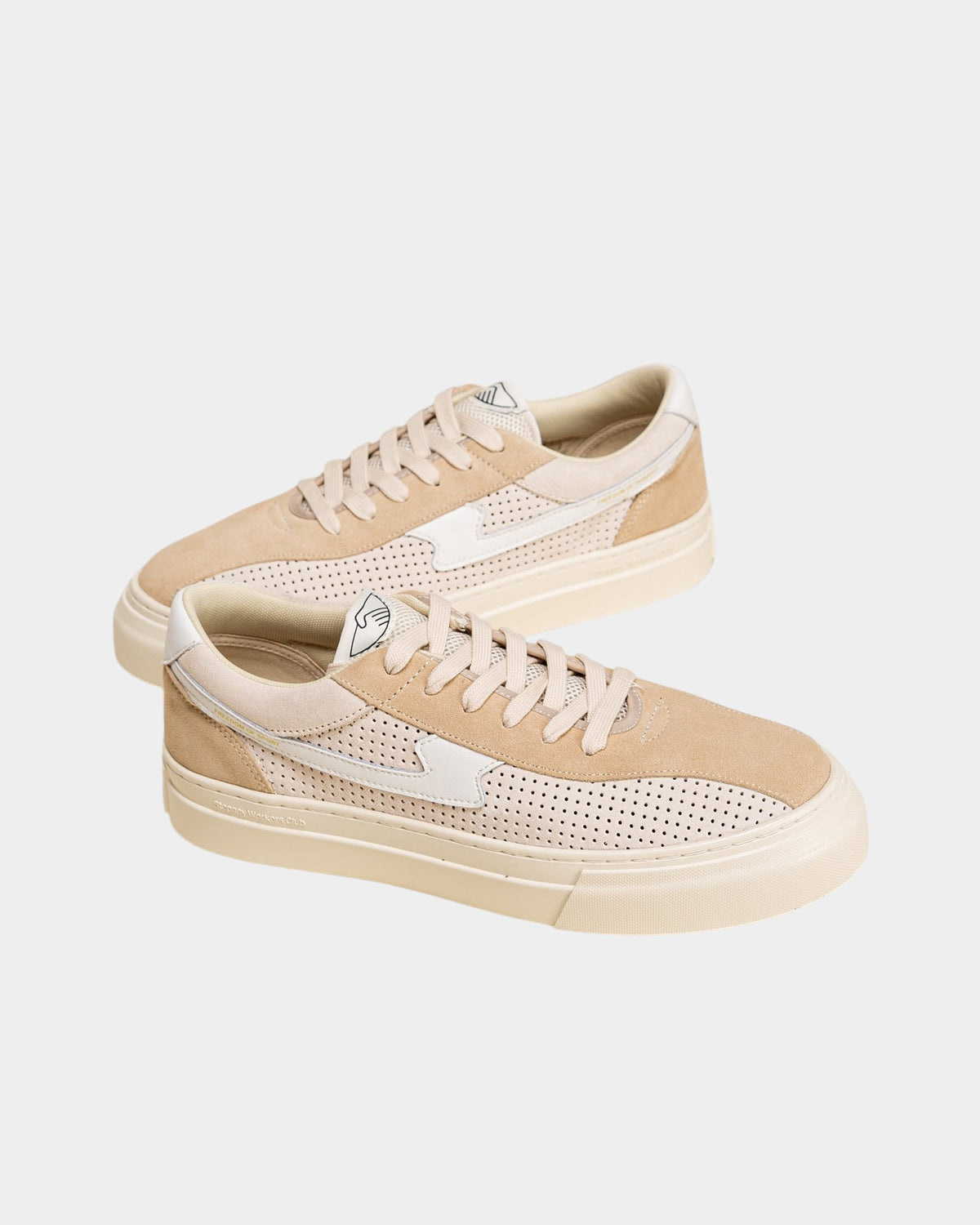 Lockwood Avenue Stepney Workers Club Dellow S-Strike sneakers in perforated ecru and beige suede with white leather.