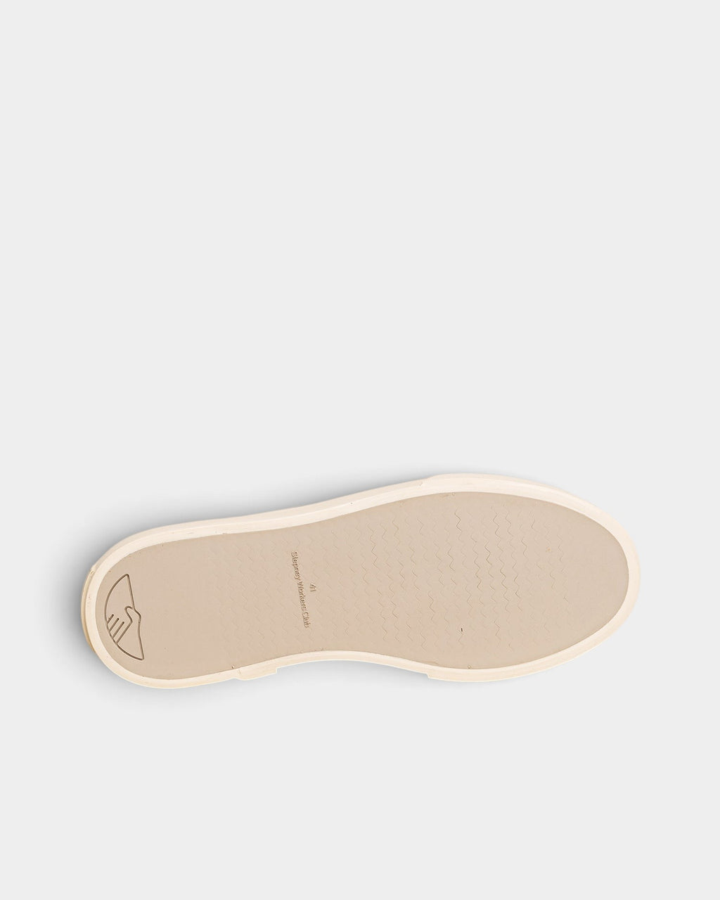 Lockwood Avenue Stepney Workers Club Dellow canvas shoe showing the textured rubber sole with handshake logo