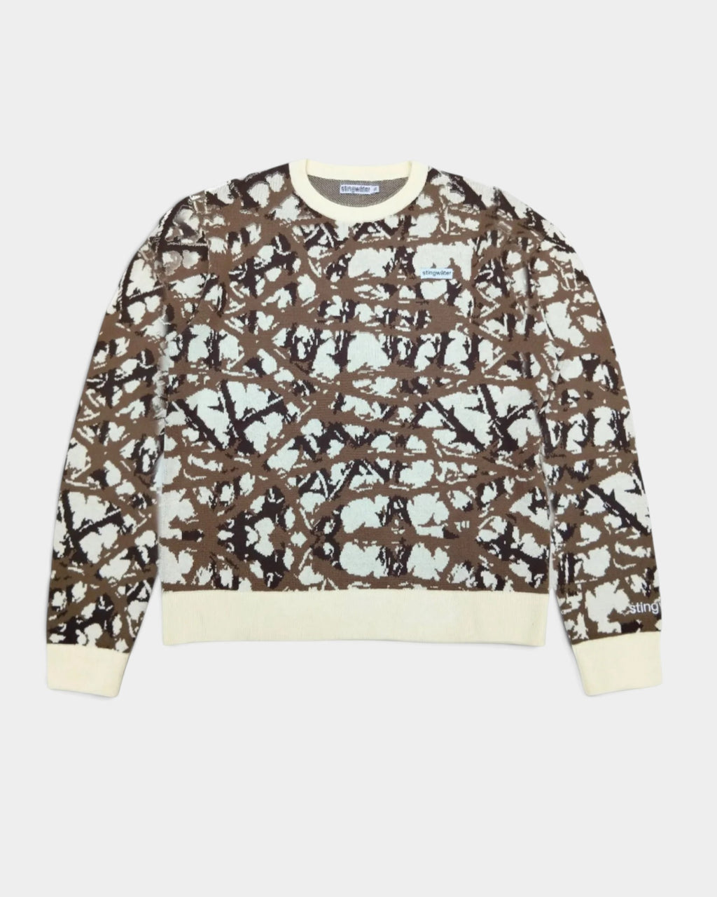 Lockwood Avenue Stingwater Thorn knit sweater in cream and brown cotton jacquard with ribbed cuffs and chest label.
