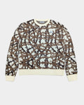 Lockwood Avenue Stingwater Thorn knit sweater in cream and brown cotton jacquard with ribbed cuffs and chest label.