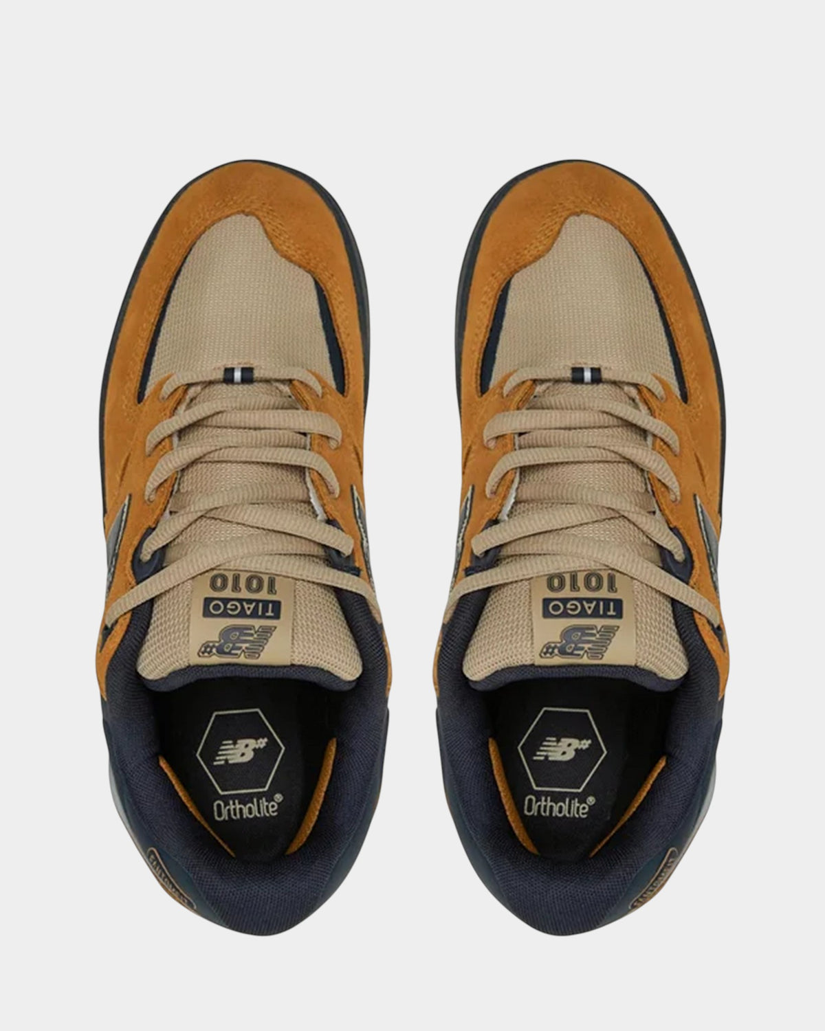 Lockwood Avenue NB Numeric Tiago Lemos 1010 skate shoes in wheat-brown suede and mesh with navy accents, top view.