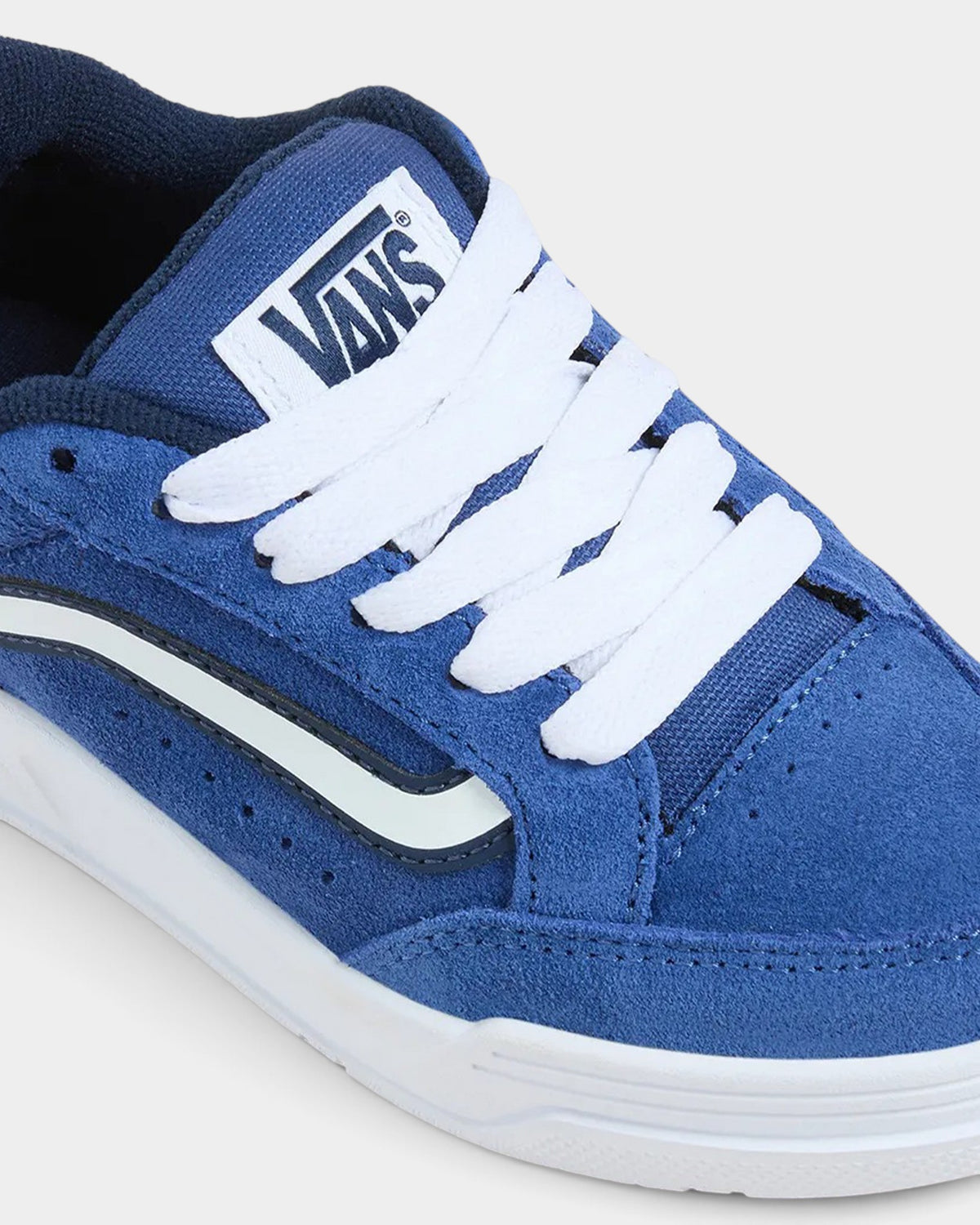 Lockwood Avenue Vans Hylane kids shoes in blue suede with white laces, puffy tongue, and navy-outlined Sidestripe.
