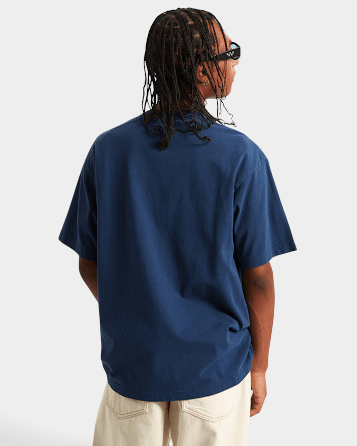 Lockwood Avenue Vans Premium loose fit navy blue cotton crew neck t-shirt worn by a man from the back view