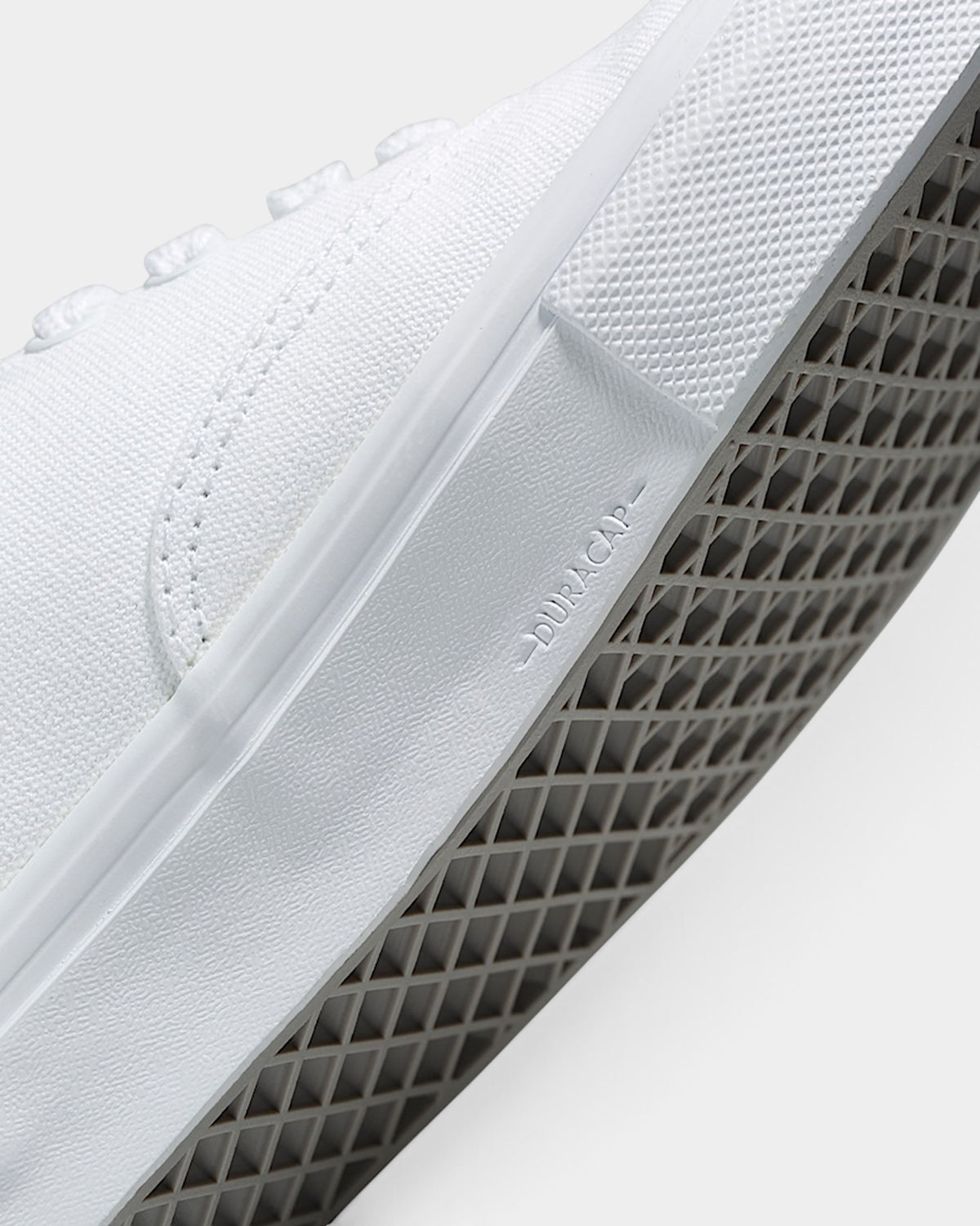 Lockwood Avenue Vans Skate Authentic shoe in True White canvas featuring a reinforced Duracap rubber midsole detail