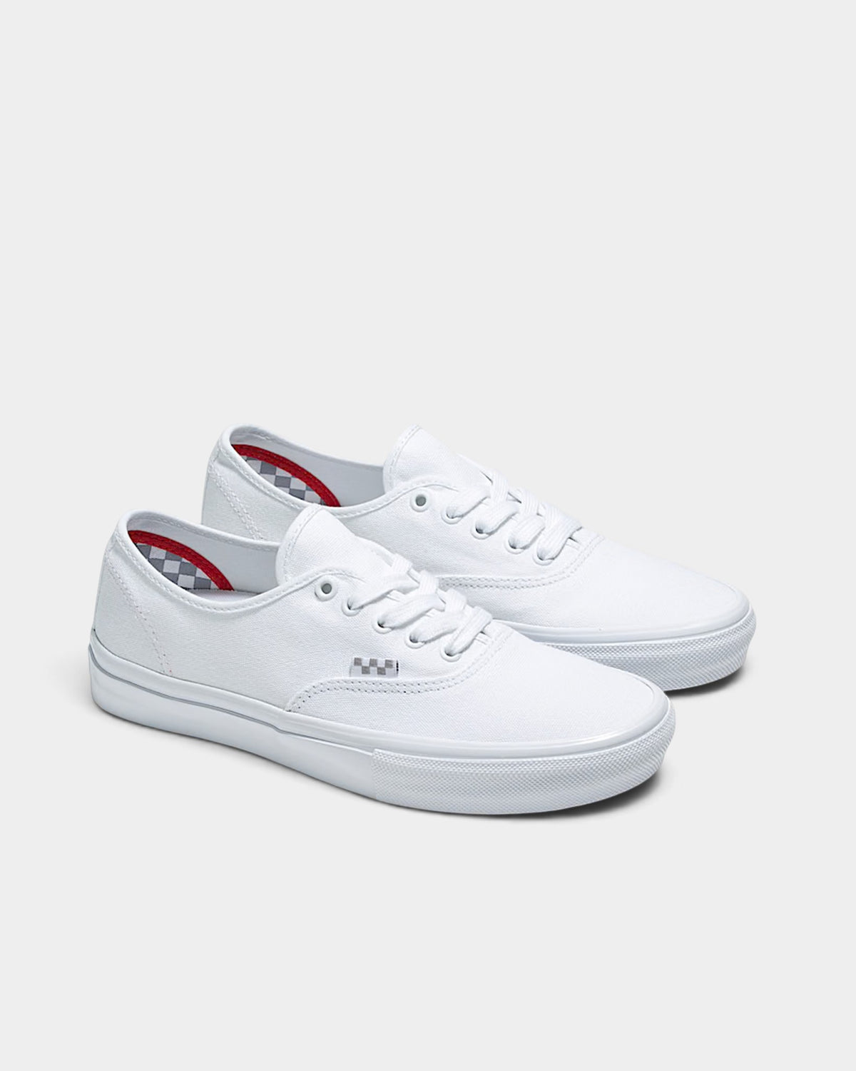 Lockwood Avenue Vans Skate Authentic shoes in true white canvas with a low-top lace-up design and gum rubber outsole.