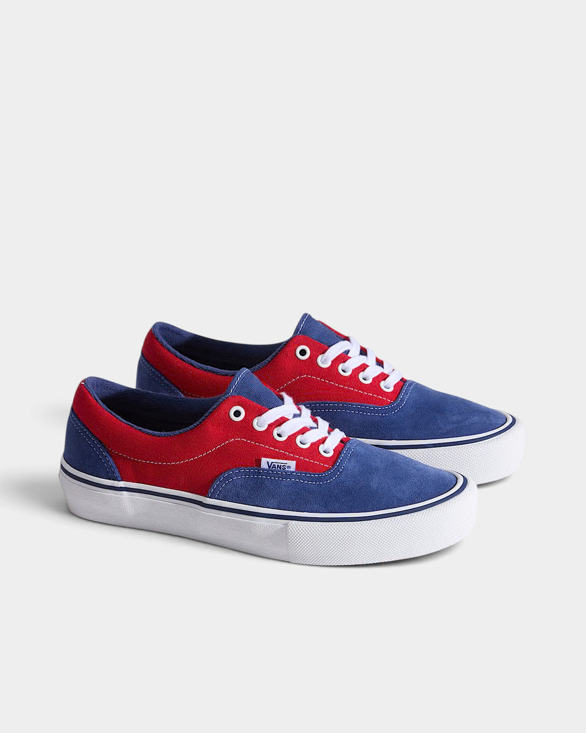 Lockwood Avenue Vans Skate Era low-top sneakers in a blue and red two-tone canvas and suede design with white laces.