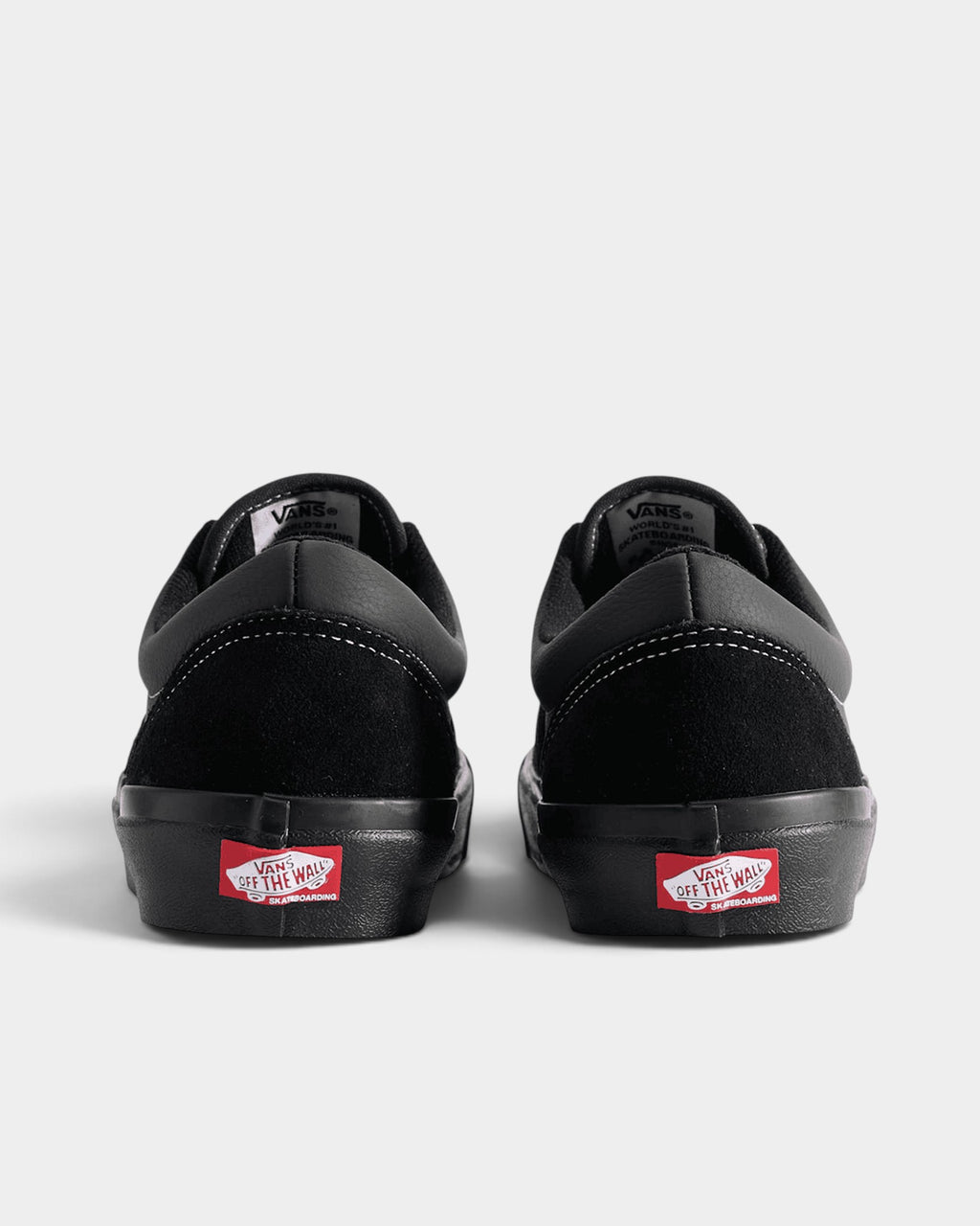 Lockwood Avenue Vans Skate Era Stub shoes in all-black suede and canvas with red heel branding, rear view.