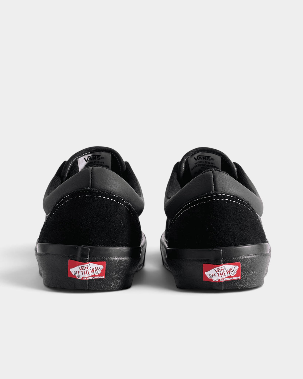 Lockwood Avenue Vans Skate Era Stub shoes in all-black suede and canvas with red heel branding, rear view.